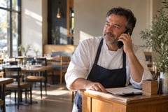Restaurant owner at the counter